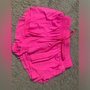 *used once* neon pink butterfly shorts in great condition!